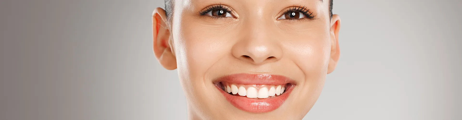 Woman smiling.